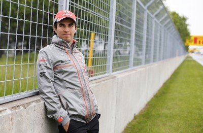 Sergio Perez walks the track