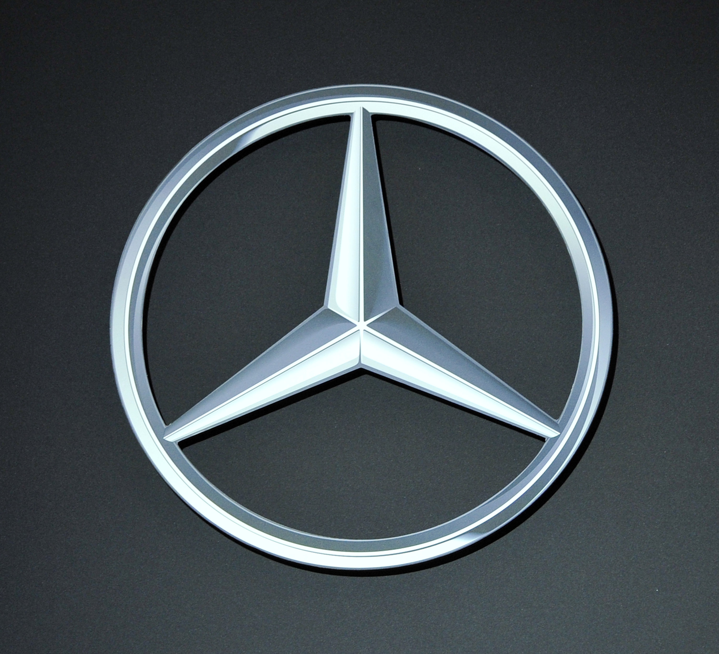 The logo for Mercedes-Benz on display at the Chicago Auto Show